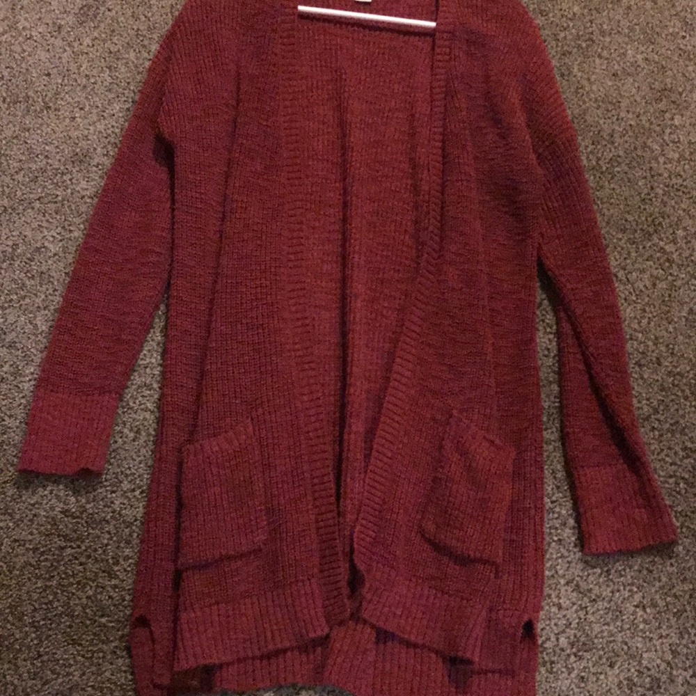 Long, red sweater cardigan with pockets